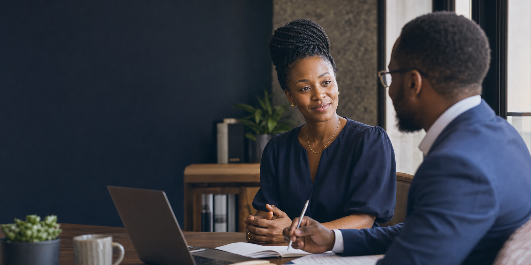 Tanzanian financial adviser supporting an entrepreneur